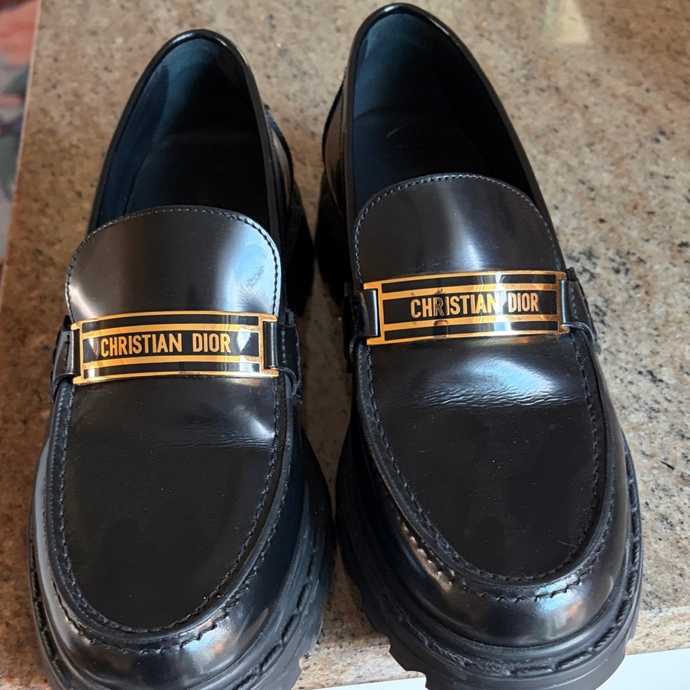 Dior Black Leather Slip-On Loafers with Gold Plaque
I do not keep boxes no box